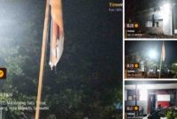 Bendera Negara kusam, robek, terpasang sampai malam hari di Kantor PAM Malalayang 